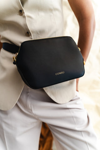 Close-up of a vegan leather bag showing the stitching and material quality