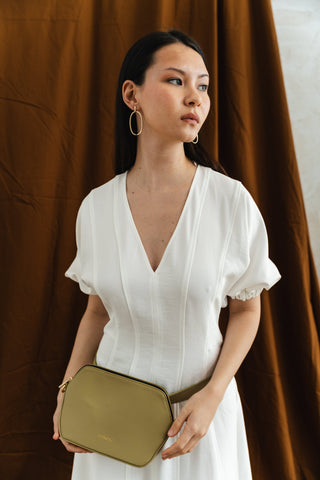 Coneli plant-based leather handbag featured in a 2026 guide to the best vegan handbags for women