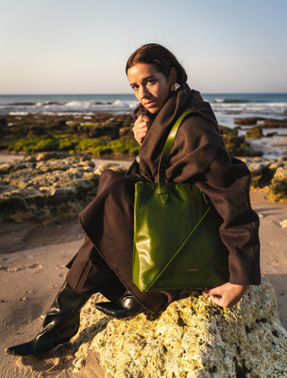 Close-up of a Coneli vegan leather bag showing the texture of plant-based leather