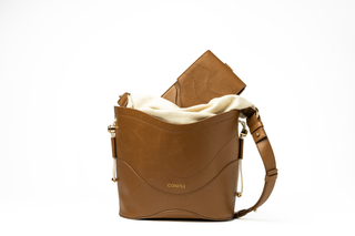 The Coneli Bucket bag in olive leather, handcrafted in Portugal